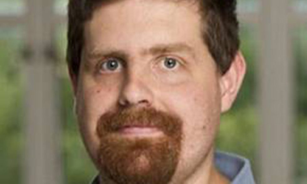 Headshot of Tyrel McQueen, PhD